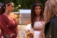 Jennifer Aydin and Teresa Giudice with Jackie goldschneider talking at a party together.