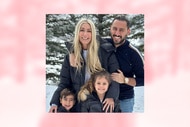 Heather Altman and Josh Altman smiling with their kids.