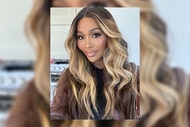 Cynthia Bailey wearing a brown and black top