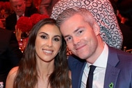 Ryan Serhant and Emilia Serhant smiling next to each other at an event.
