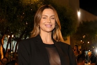 Lala Kent wearing a sheer top and a black blazer at Sutton Stracke's fashion event