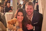 Lisa Vanderpump and Max Todd hugging and posing together.