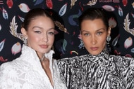 Gigi Hadid and her sister Bella Hadid on the red carpet for Harper's Bazaar Exhibition