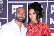 John Fuda with Rachel Fuda in front of the WWHL step and repeat