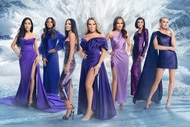 The cast of The Real Housewives of Salt Lake City wearing purple gowns and standing in front of snowy mountains