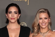 Ariana Madix and Katie Maloney posing in front of a step and repeat at the Creative Arts Emmys.