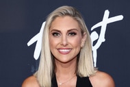 Gina Kirschenheiter smiling in front of a step and repeat.