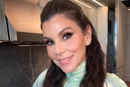 Heather Dubrow posing in a kitchen.