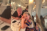 Paul Kemsley with his daughter Phoenix Kemsley at a restaurant together