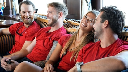 Iain Maclean, Nathan Gallagher, Gael Cameron, and Joe Brittany sitting together and laughing.