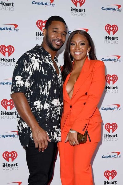 Image of Drew Sidora and Ralph Pittman on a red carpet