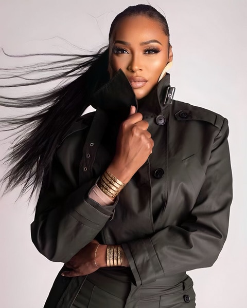 Cynthia Bailey wearing a black jacket and black pants