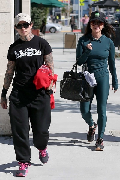 Morgan Wade and Kyle Richards walking on the side walk in Los Angeles.