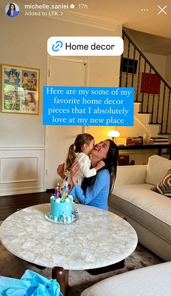 Michelle Lally hugging Isabella Lally in her living room.