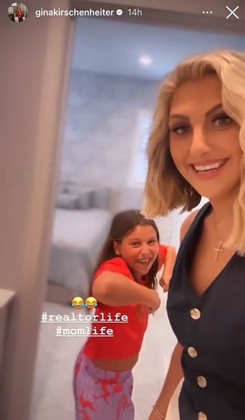 Gina Kirschenheiter and her daughter in a bathroom.