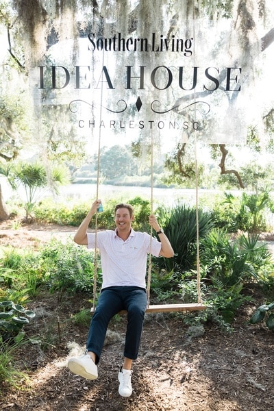 Austen Kroll of Southern Charm sits on a swing.