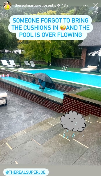 Joseph Benigno uses an umbrella in Margaret Joseph's pool as the pool overflows with water.