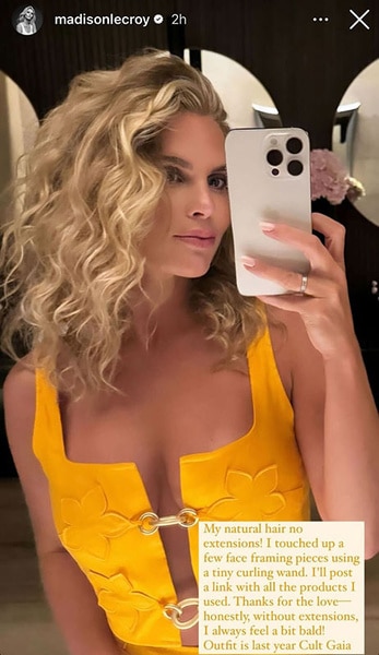 Madison LeCroy posing in a yellow top in a mirror.