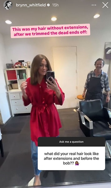 Brynn Whitfield posing in the mirror at the salon.