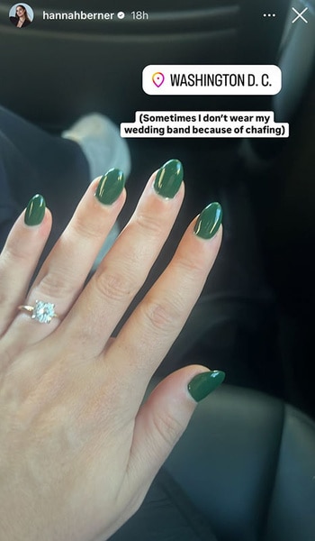 Hannah Berner showing her engagement ring while sitting in a car.