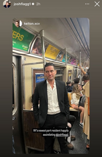 Josh Flagg standing on the New York City subway.