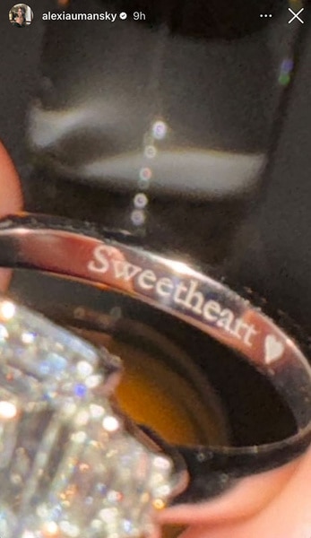 A closeup of the engraving on Alexia Umansky's engagement ring.