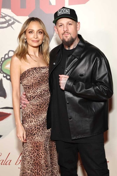 Nicole Richie and Joel Madden on a step and repeat for the Carlos Eric Lopez's Fourth Annual Día de Muertos Gala