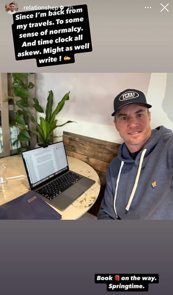 Shep Rose sitting in front of a computer, writing.