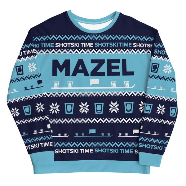 A sweater with "Mazel" quoted on it.