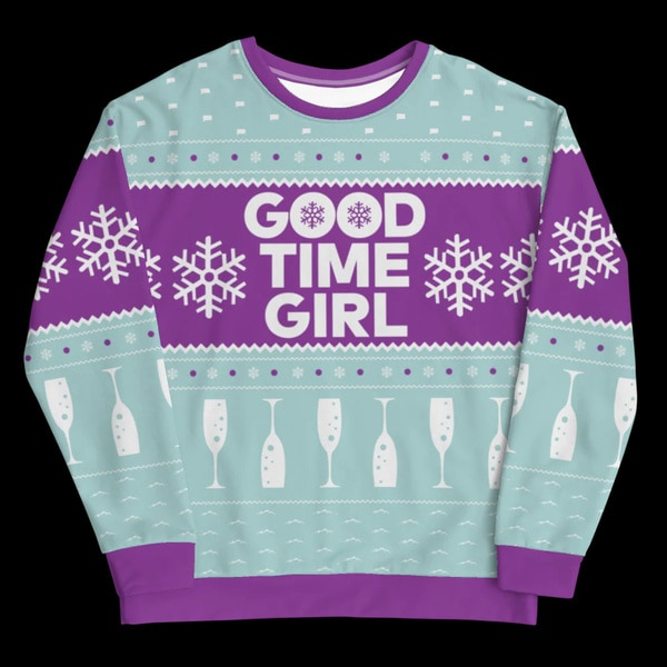 A sweater with "Good time girl" quoted on it.