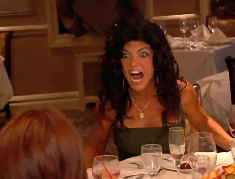 Teresa Giudice yelling at Danielle Staub before flipping the table.