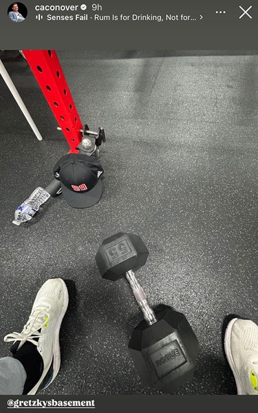 Craig Conover working out in a gym.