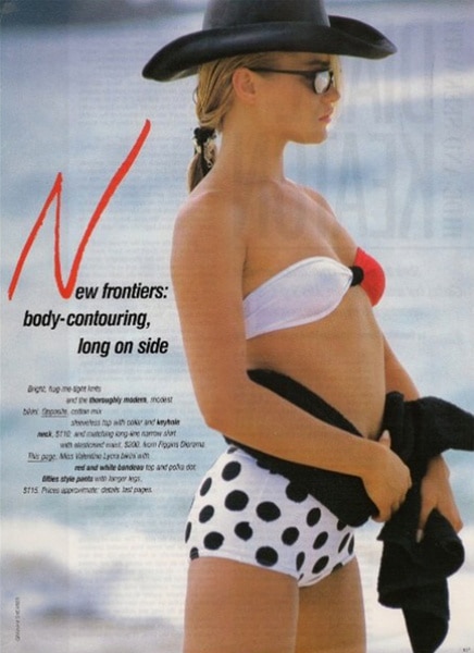 Yolanda Hadid modeling a white bikini with black polka dots in a magazine