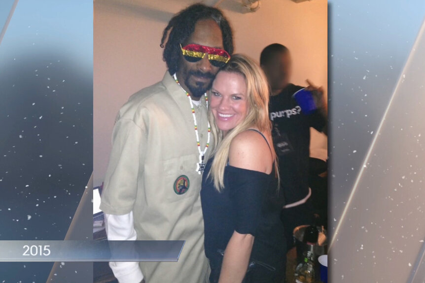 Heather Gay and Snoop Dog at a party together.