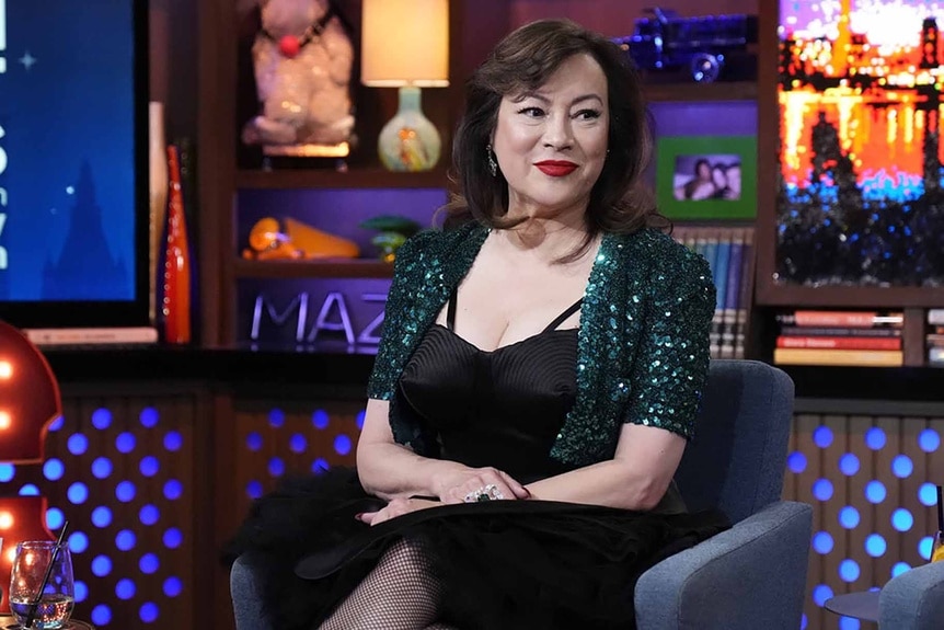 Jennifer Tilly smiles on Watch What Happens Live with Andy Cohen.