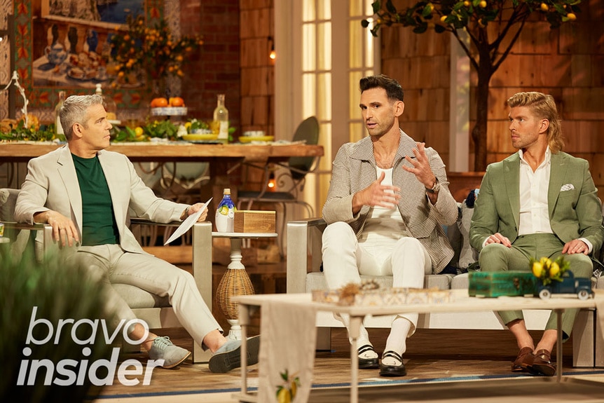 Andy Cohen interviewing Carl Radke and Kyle Cooke sitting on the Summer House Season 8 reunion.