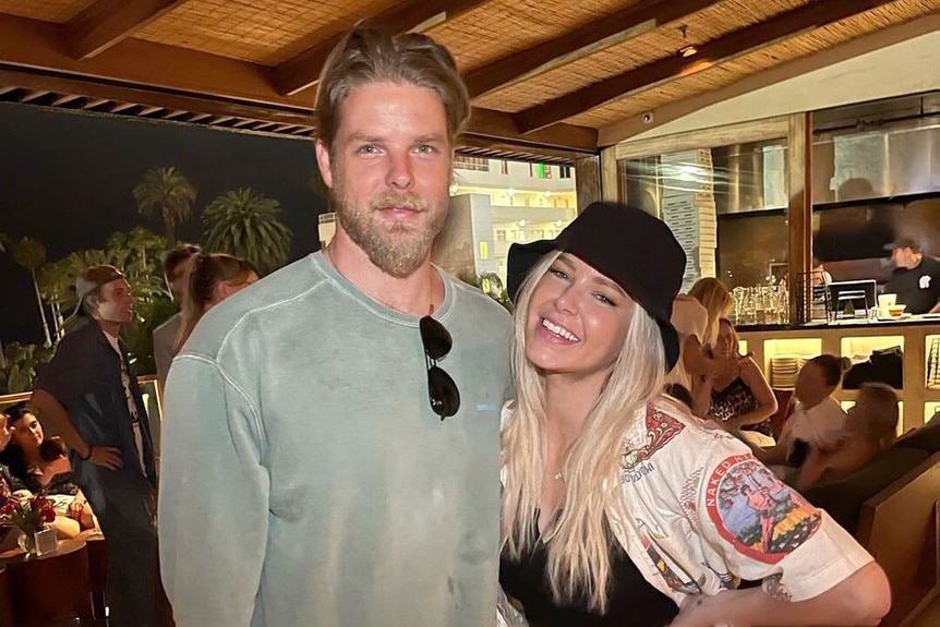 Jeremy Madix and Ariana Madix smiling while out together.