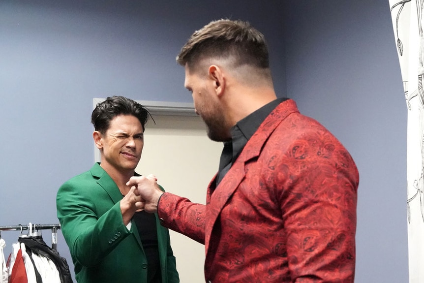 Tom Sandoval gives Brock Davies a fist bump BTS at the VPR reunion