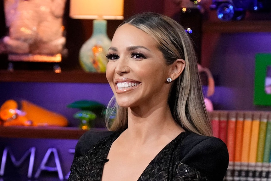 Scheana Shay wearing a black pant suit at WWHL