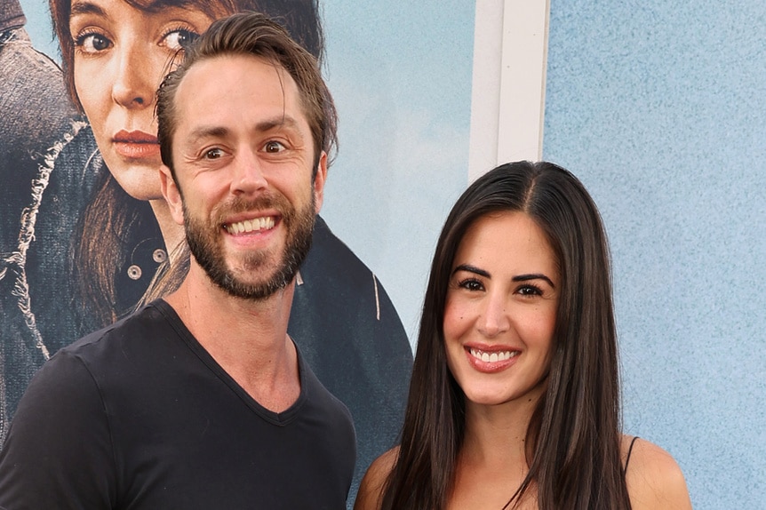 Michelle Lally and Aaron Nosler on the arrivals carpet for the movie premiere of "The Bikeriders"