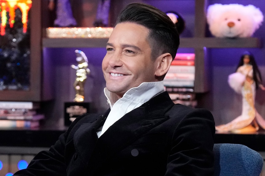 Josh Flagg sitting as a guest at Watch What Happens Live