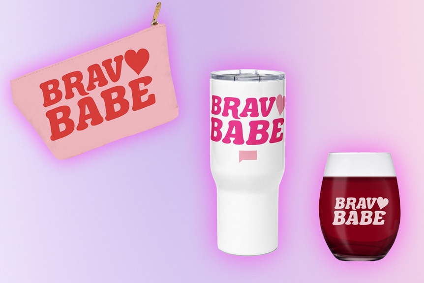 A pouch, a tumbler and a stemless wineglass that all say, Bravo Babe, on a light pink background.