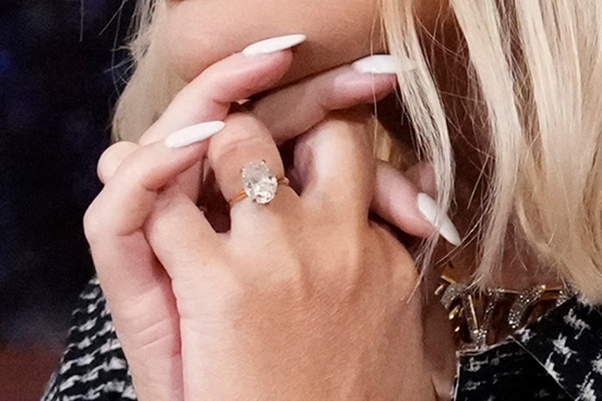 Detail shot of Caroline Stanbury's engagement ring.