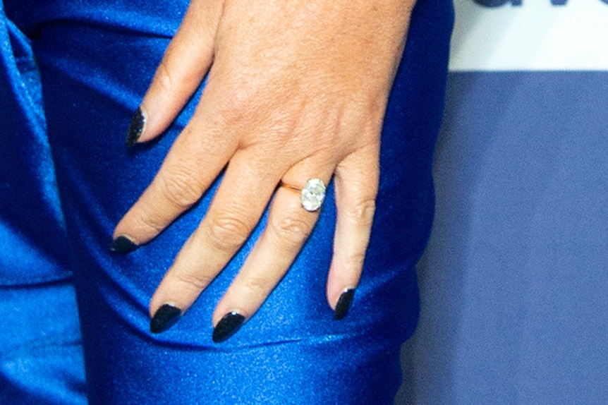 Detail shot of Caroline Stanbury's engagement ring.