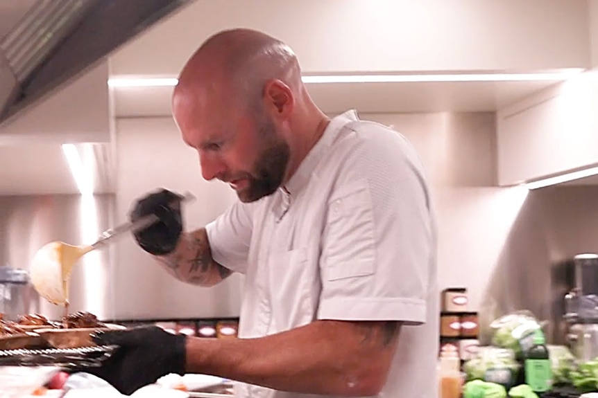 Chef Dave cooking for Captain Sandy and Leah Shafer's wedding