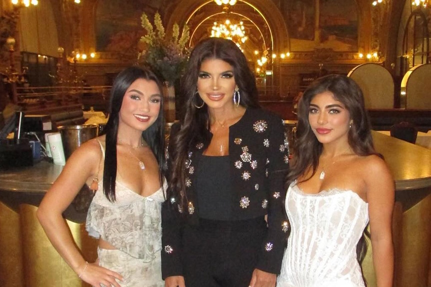 Teresa Giudice, Milania Giudice, and Gabriella Giudice smiling and posing together.