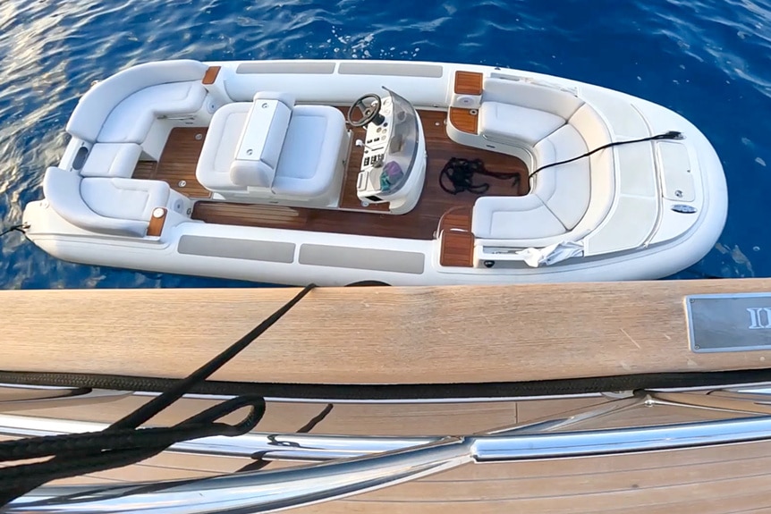 The Parsifal 3 yacht's tender sitting in the ocean.