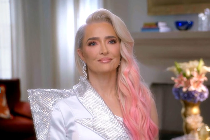 Erika Jayne with light pink hair extentions during a RHOBH interview