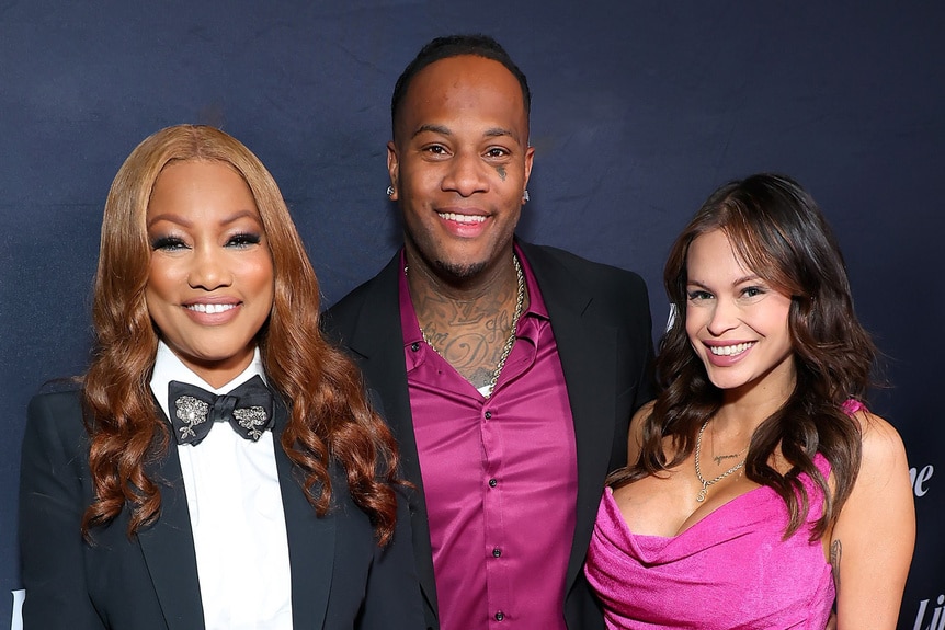 Garcelle Beauvais, her son, Oliver Saunders, and his girlfriend at an event.