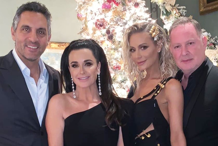 Kyle Richards, Mauricio Umansky, Dorit Kemsley, and PK Kemsley with Boy George.